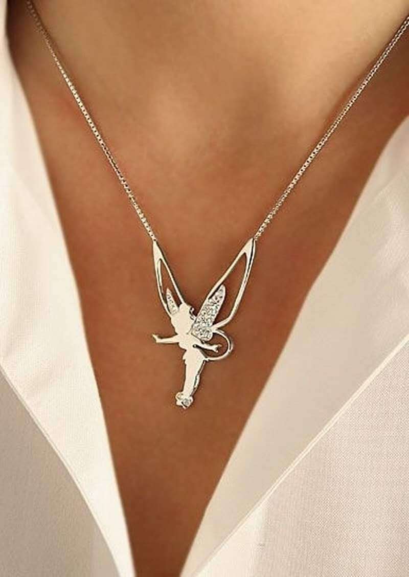 Gold necklace with fairy pendant