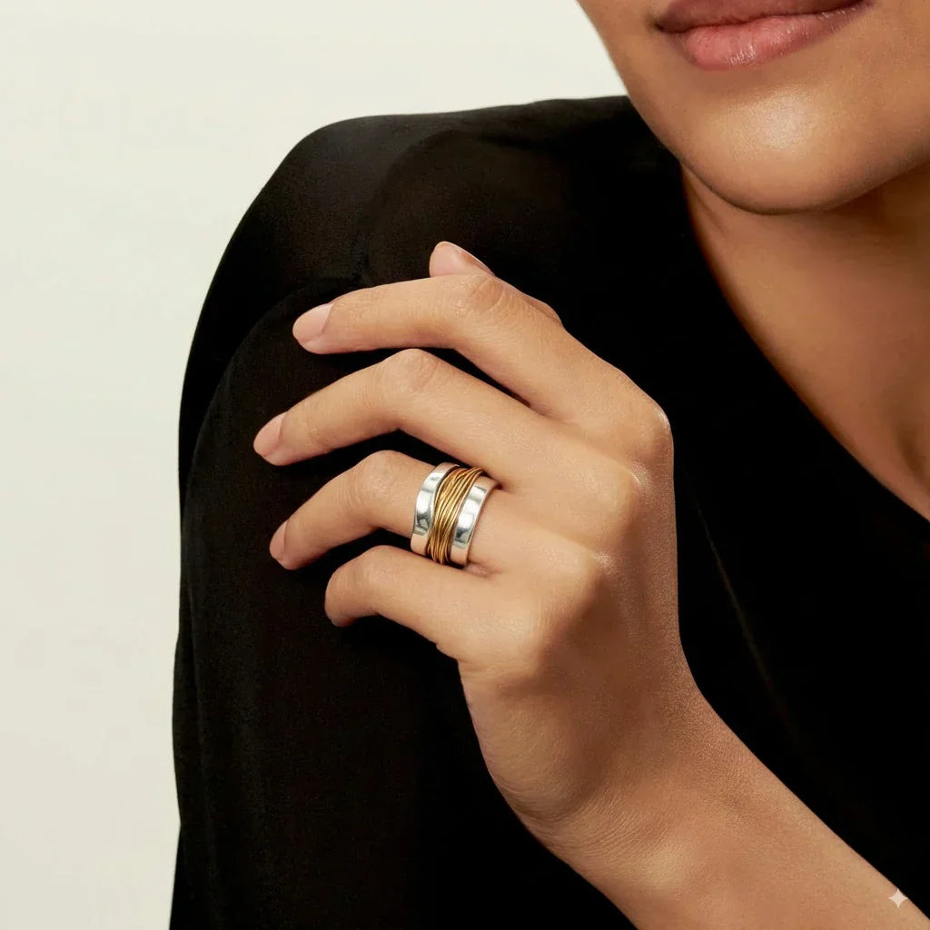 Silver ring with golden thread